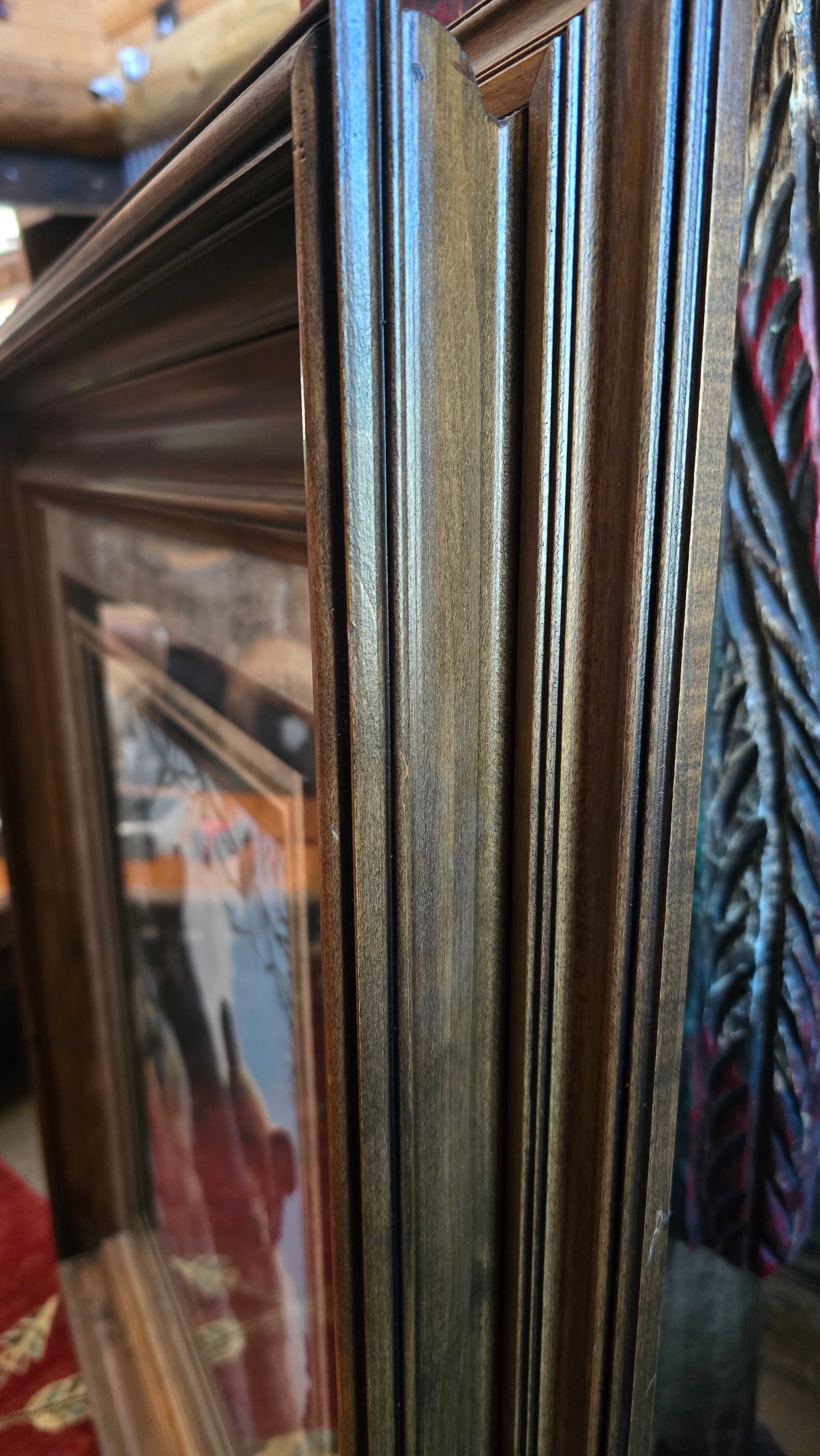 Two Black Bear Cubs Climbing in a Pine Tree with a Wood Frame