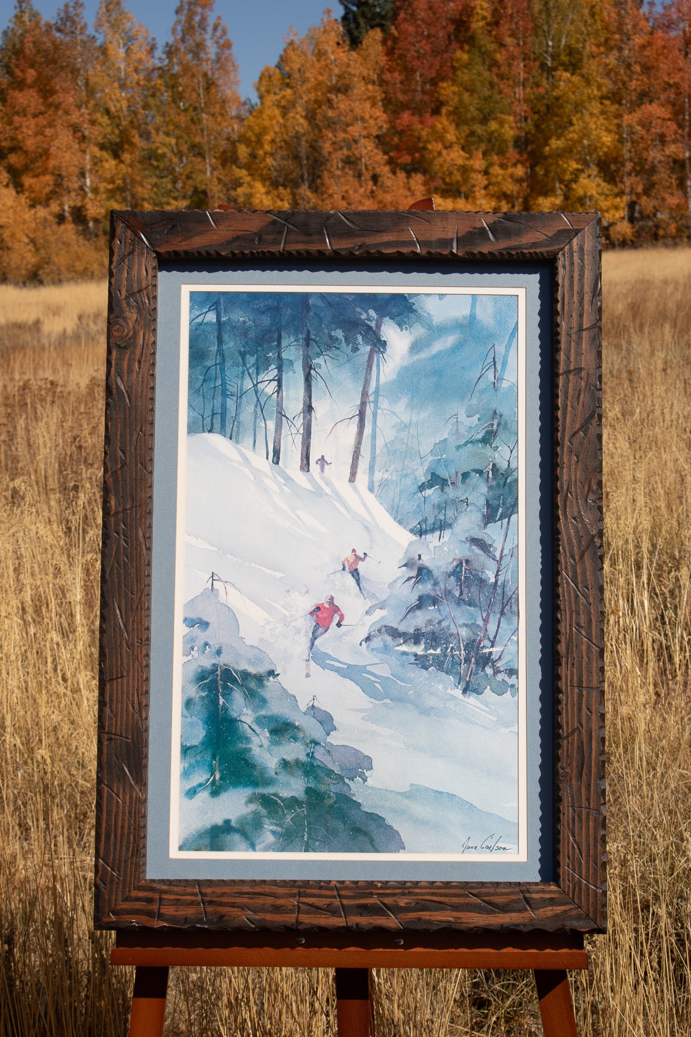 Large Framed Art Work Featuring 3 Skier Signed by Jane Carlson
