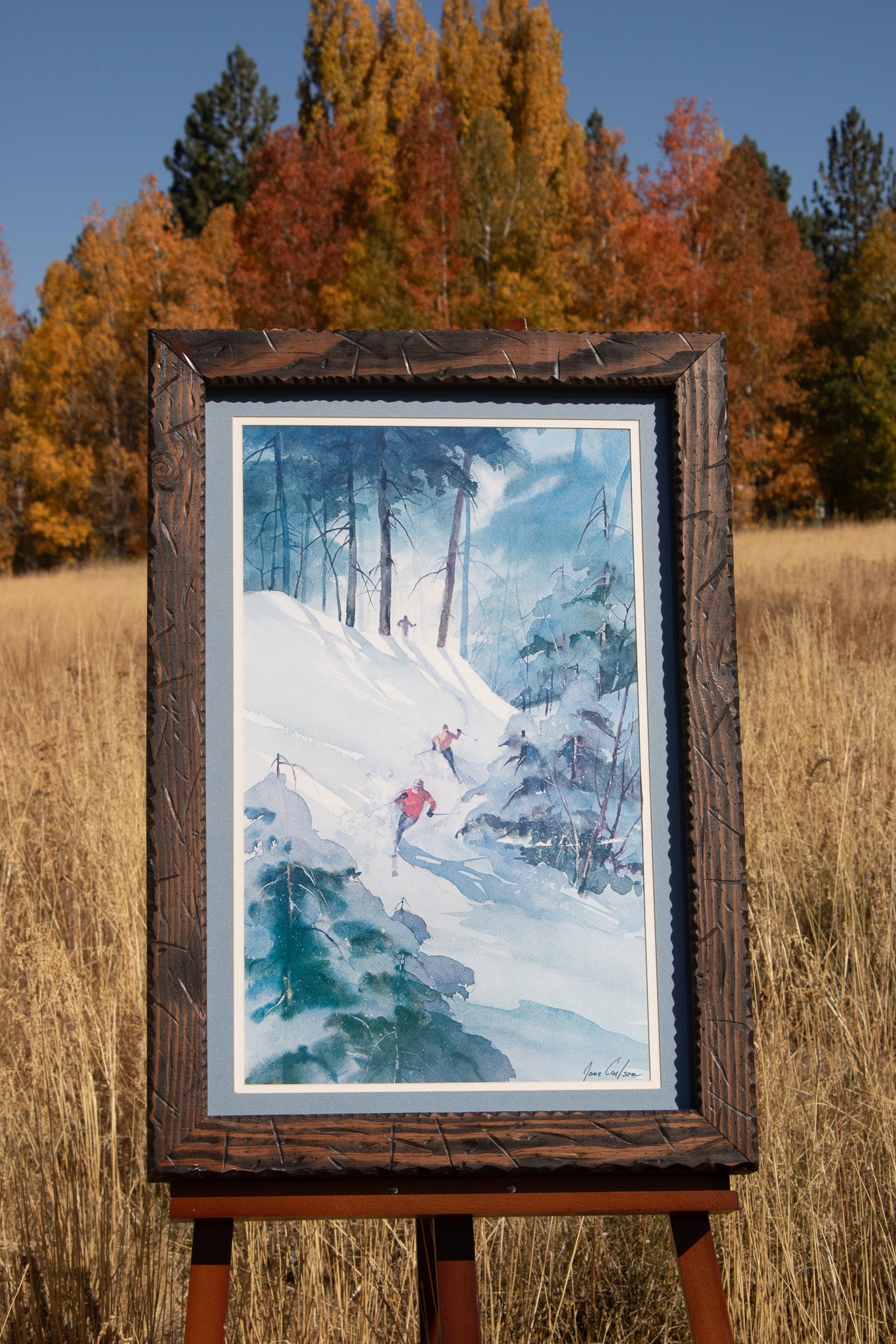 Large Framed Art Work Featuring 3 Skier Signed by Jane Carlson